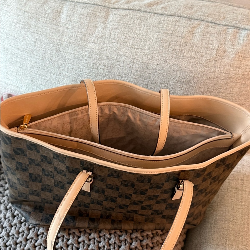 MICHAEL Michael Kors Jet Set travel tote in a brown checkered monogram pattern. - Picture 4 of 10